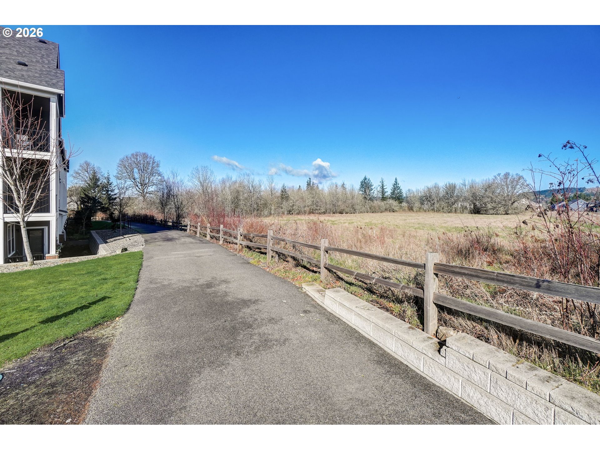 16417 Northwest Chadwick Way, Unit 302 Portland, OR 97229 - Photo 16 of 20 a view of a yard with an outdoor space