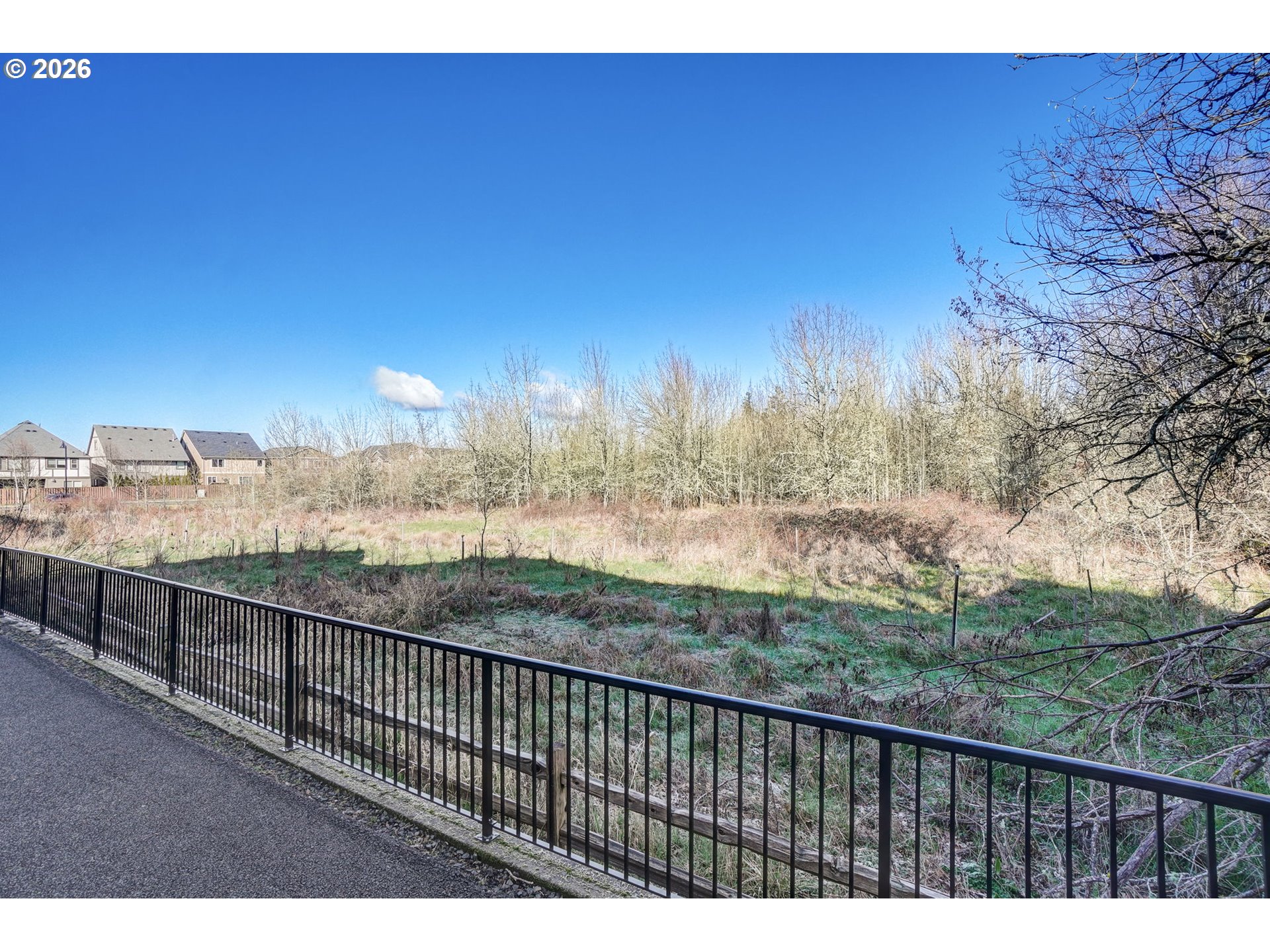 16417 Northwest Chadwick Way, Unit 302 Portland, OR 97229 - Photo 18 of 20 a view of city and mountain from balcony