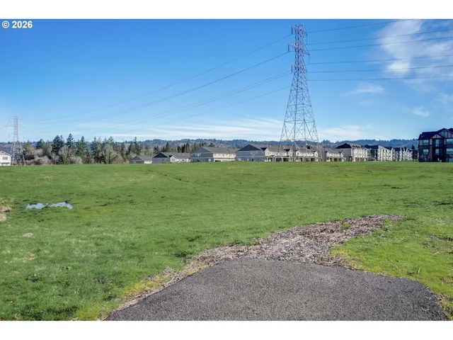 a view of a field with an outdoor space