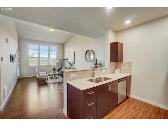 a bathroom with a sink double vanity and a mirror