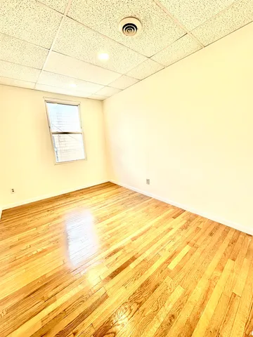 a view of a room with an empty space