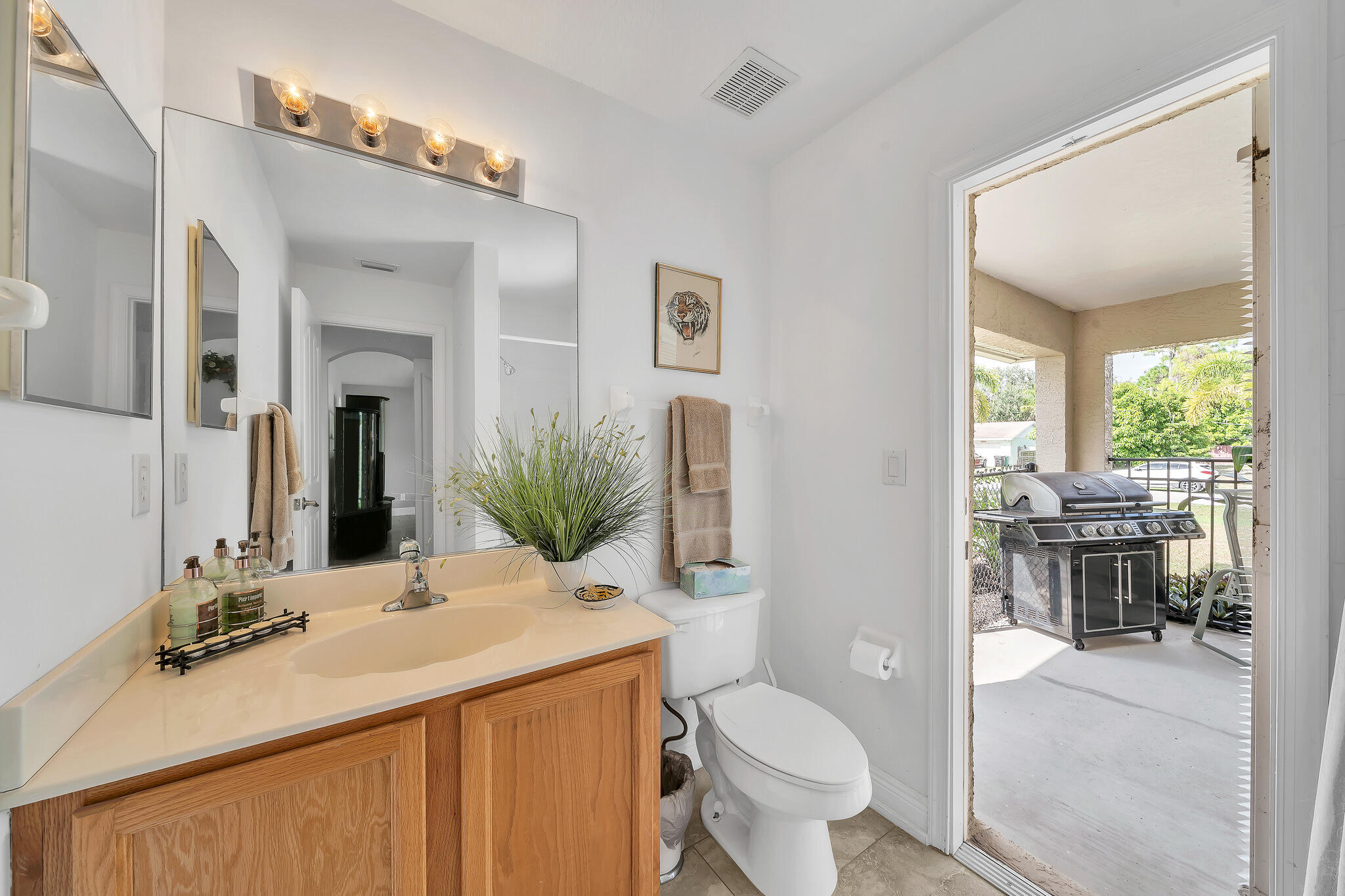 2400 Southeast Shipping Road Port St. Lucie, FL 34952 - Photo 37 of 57 1st Guest Bath w/ Cabana Door