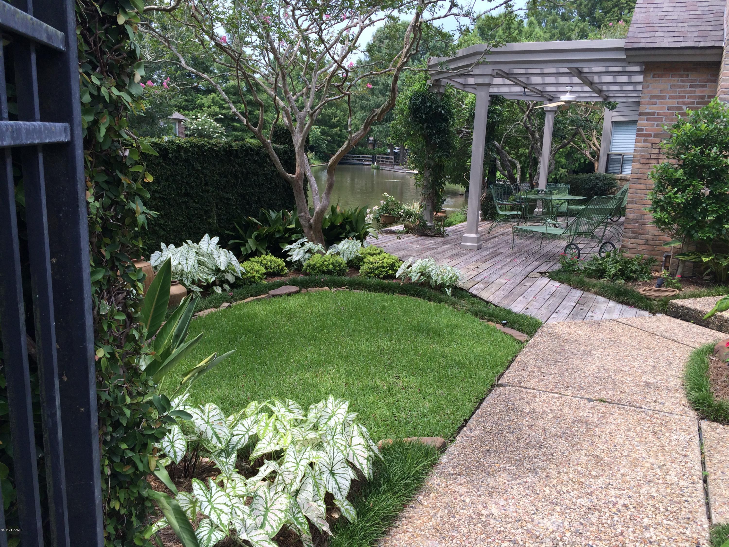 103 Island Point Lafayette, LA 70508 - Photo 2 of 24 Walking into Courtyard