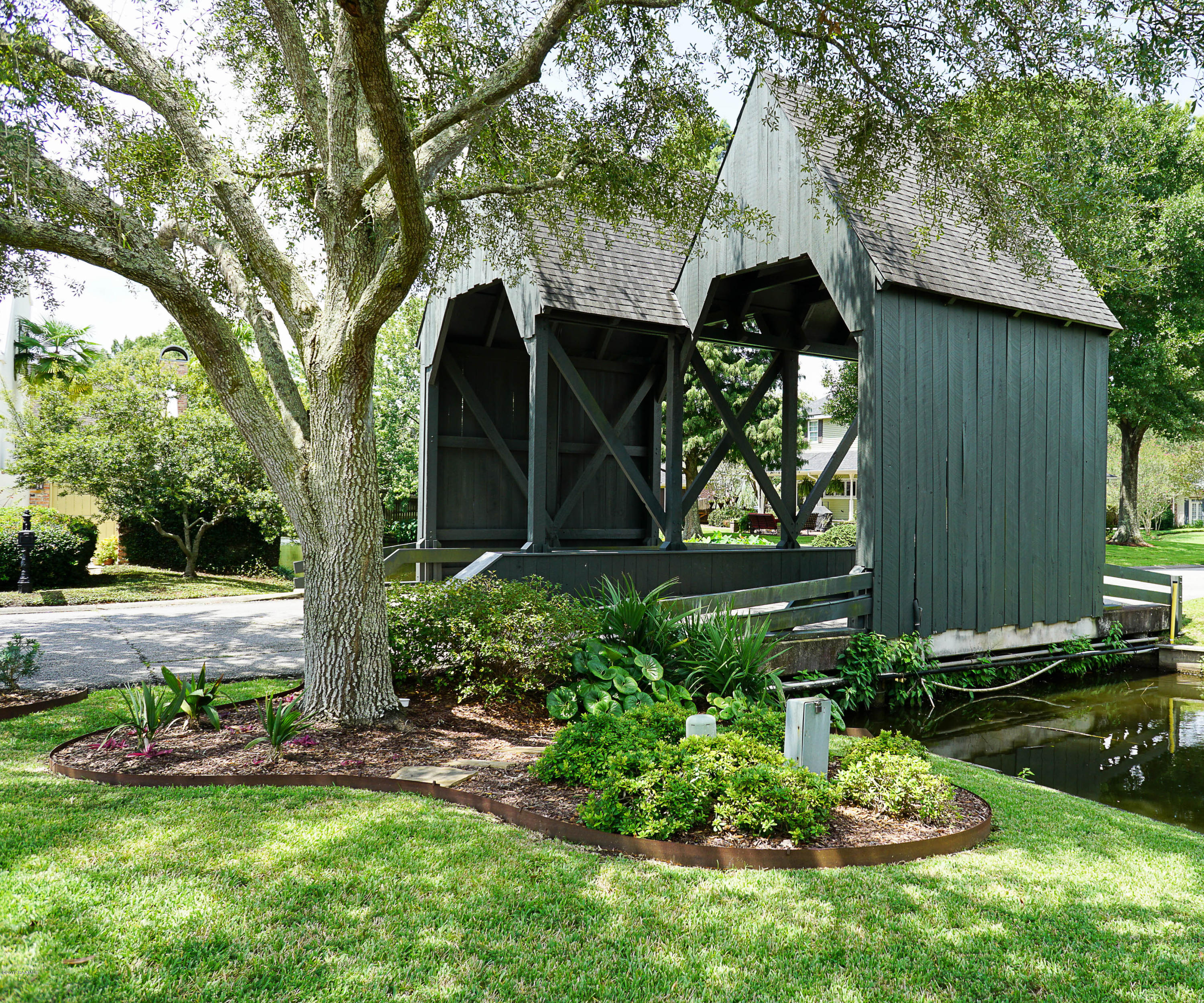 103 Island Point Lafayette, LA 70508 - Photo 24 of 24 Covered Bridge Leading to Home