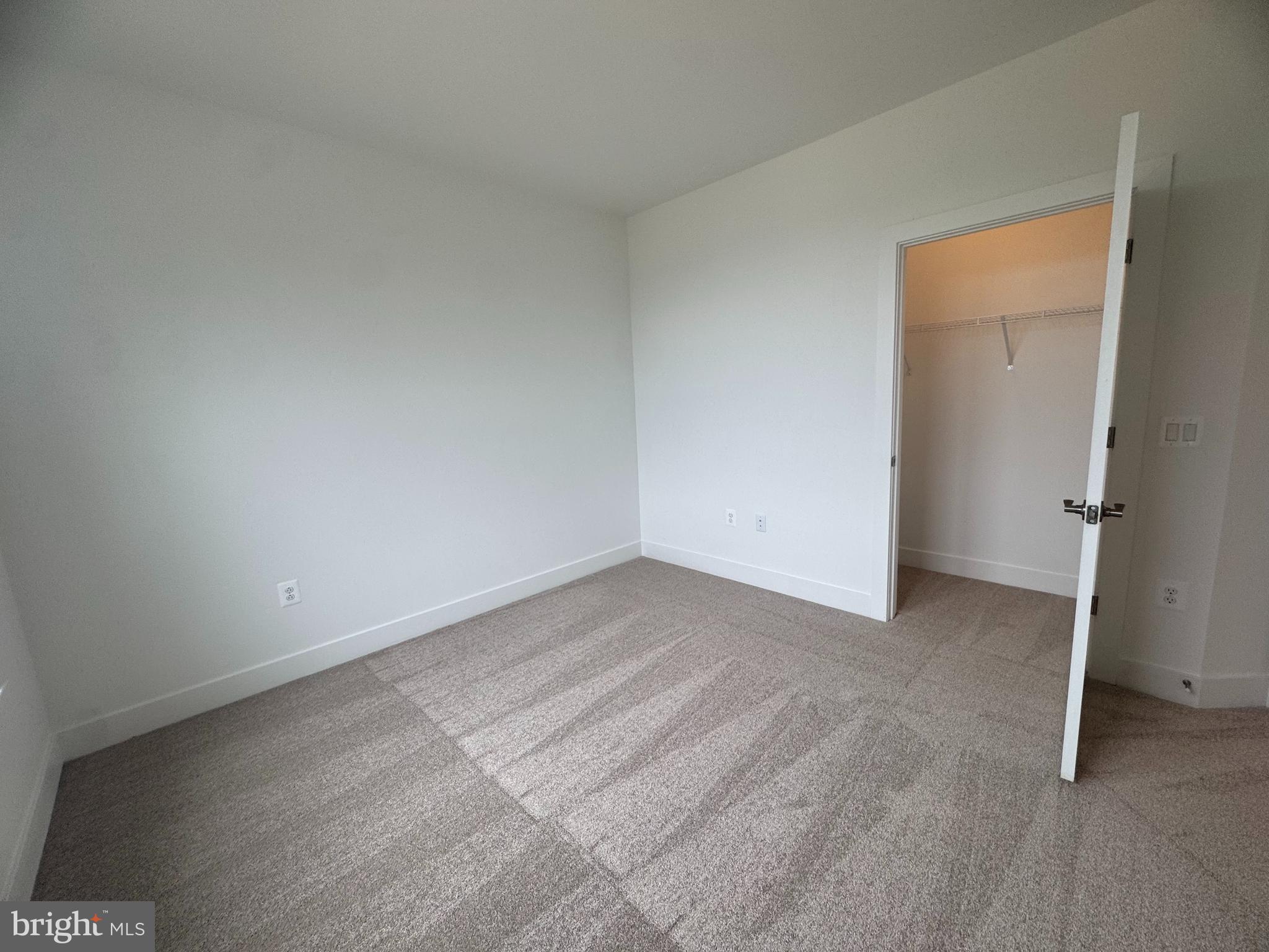 82 Valerian Loop, Unit 2 Stafford, VA 22554 - Photo 16 of 55 a view of an empty room