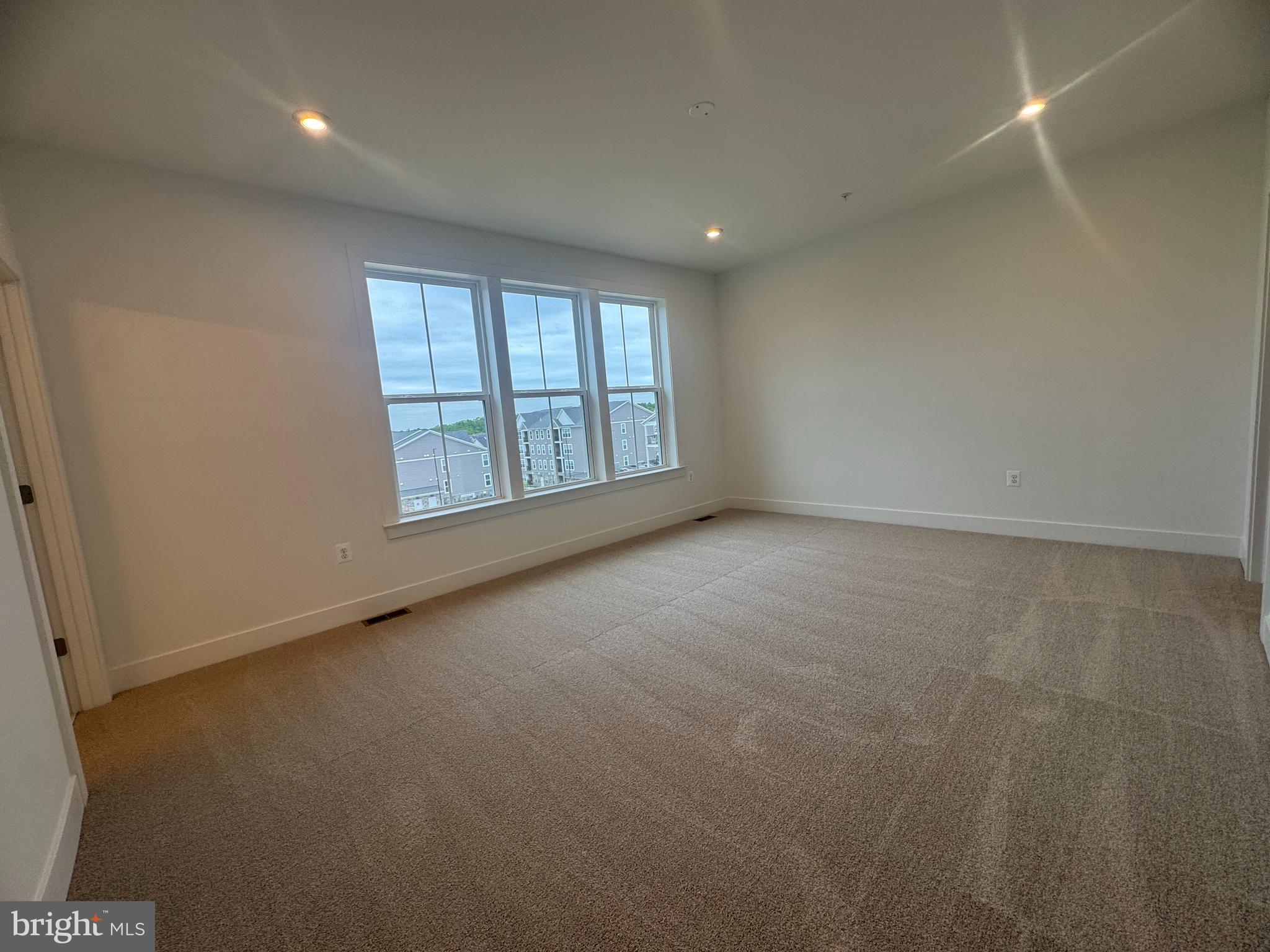 82 Valerian Loop, Unit 2 Stafford, VA 22554 - Photo 19 of 55 an empty room with windows
