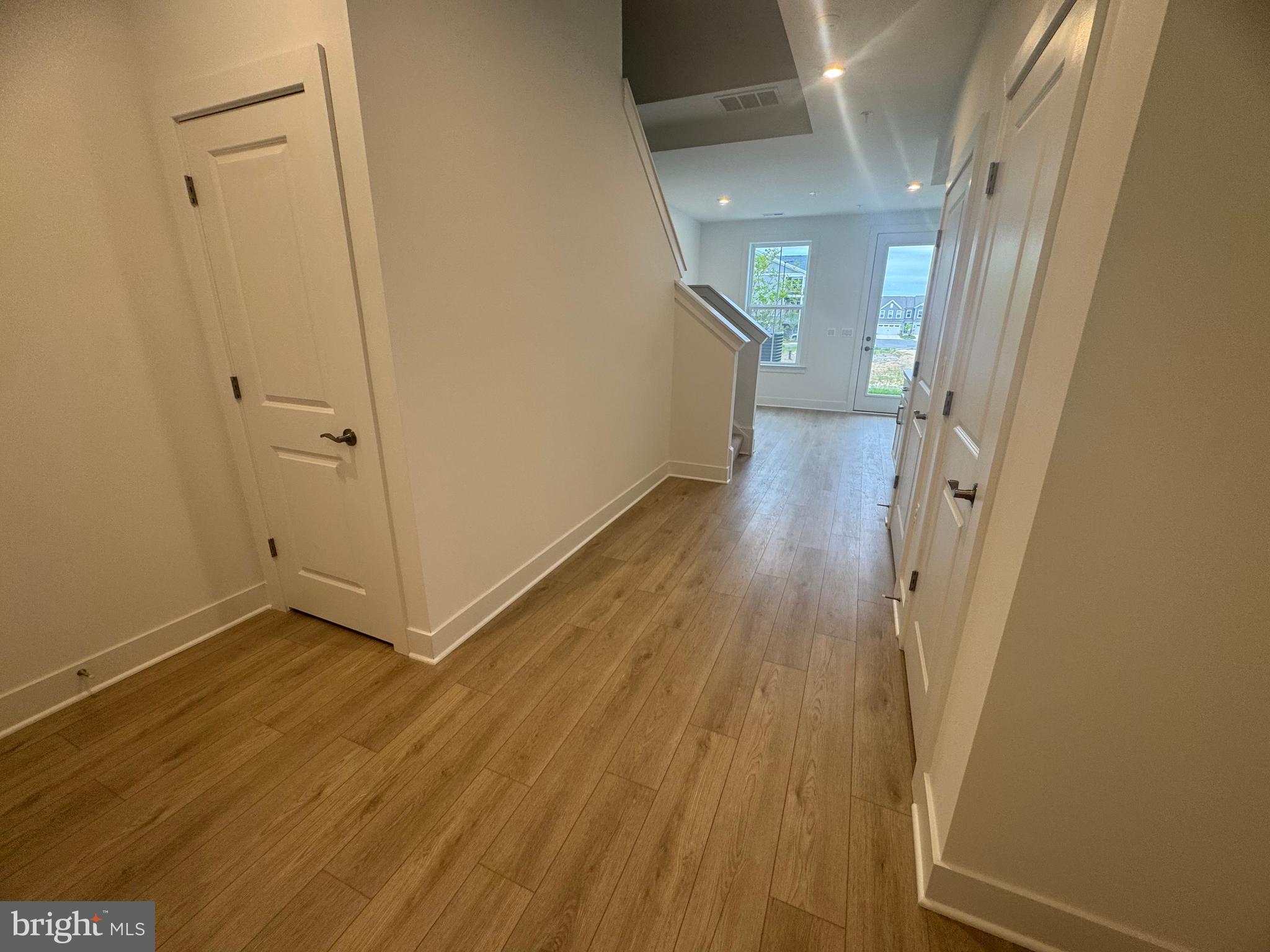 82 Valerian Loop, Unit 2 Stafford, VA 22554 - Photo 20 of 55 a view of a hallway with wooden floor