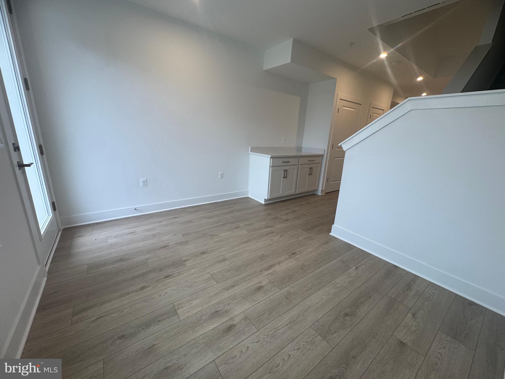 82 Valerian Loop, Unit 2 Stafford, VA 22554 - Photo 21 of 55 an empty room with wooden floor