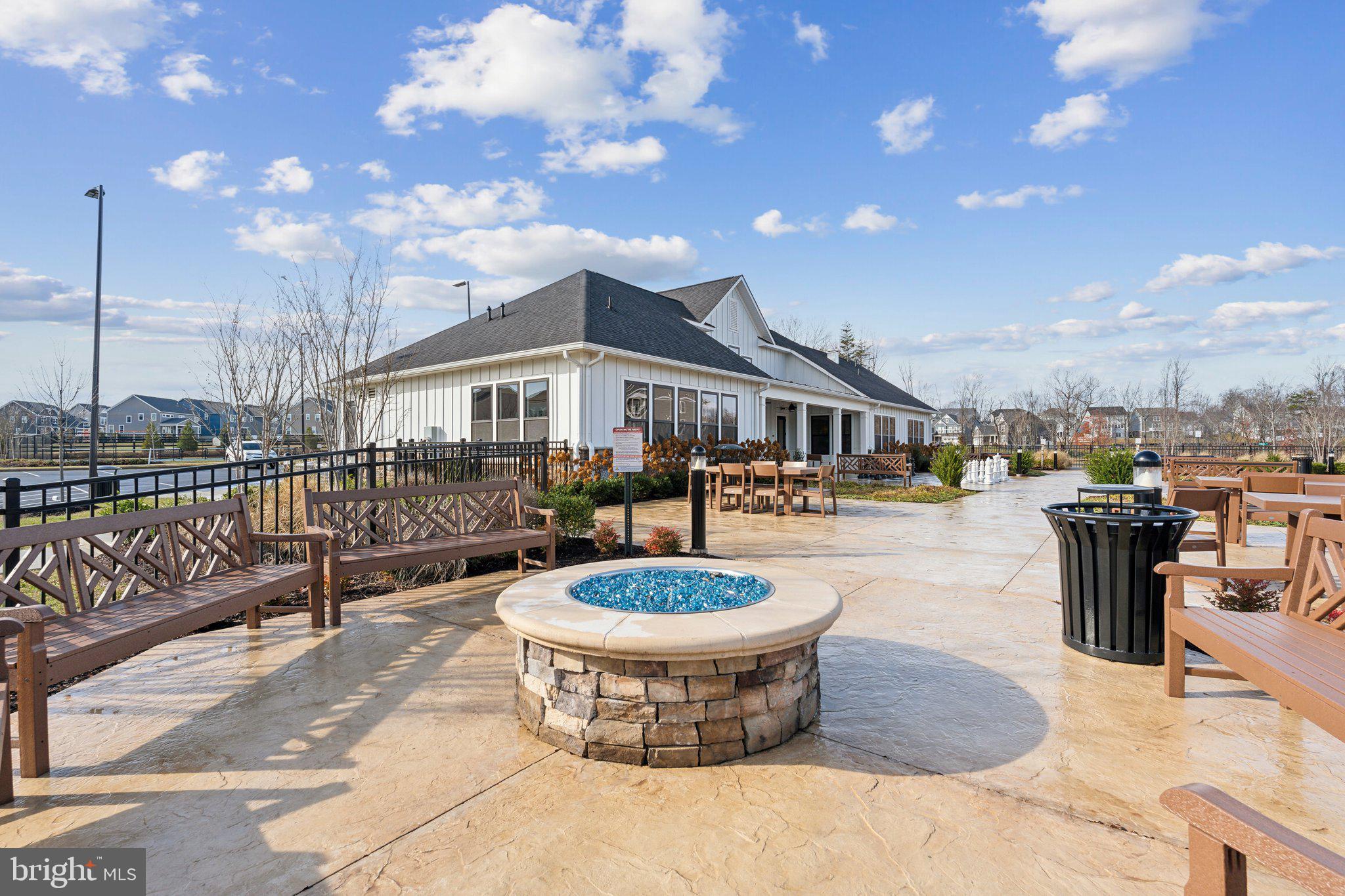 82 Valerian Loop, Unit 2 Stafford, VA 22554 - Photo 50 of 55 a view of a house with backyard porch and sitting area