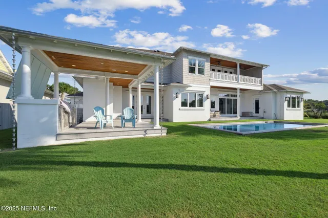 a view of swimming pool with a garden
