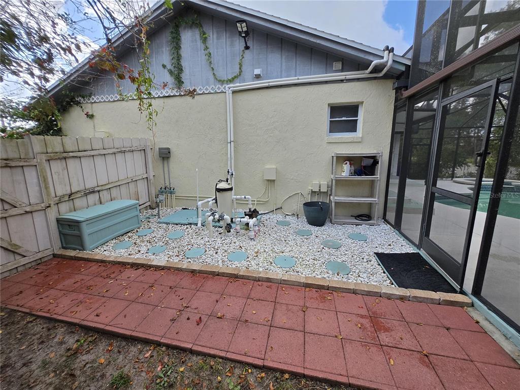 7607 Benji Ridge Trail Kissimmee, FL 34747 - Photo 28 of 58 a bathroom with a granite countertop sink and a mirror