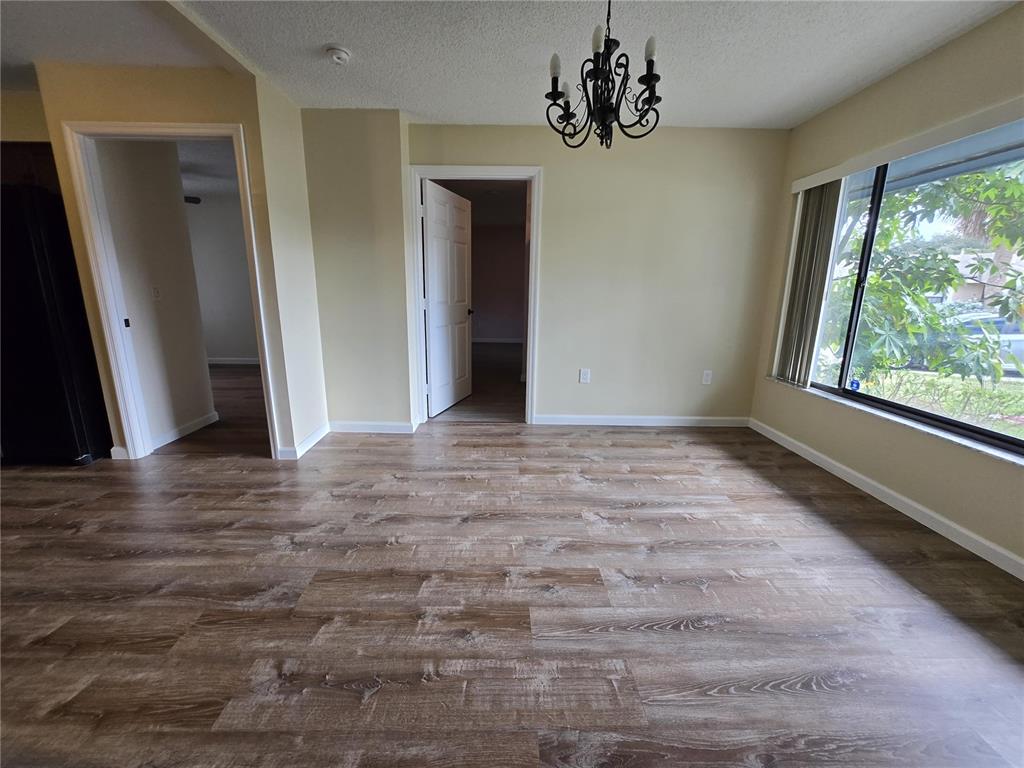 7607 Benji Ridge Trail Kissimmee, FL 34747 - Photo 33 of 58 a view of an empty room with a window