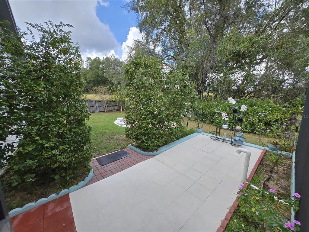 7607 Benji Ridge Trail Kissimmee, FL 34747 - Photo 42 of 58 a view of a yard