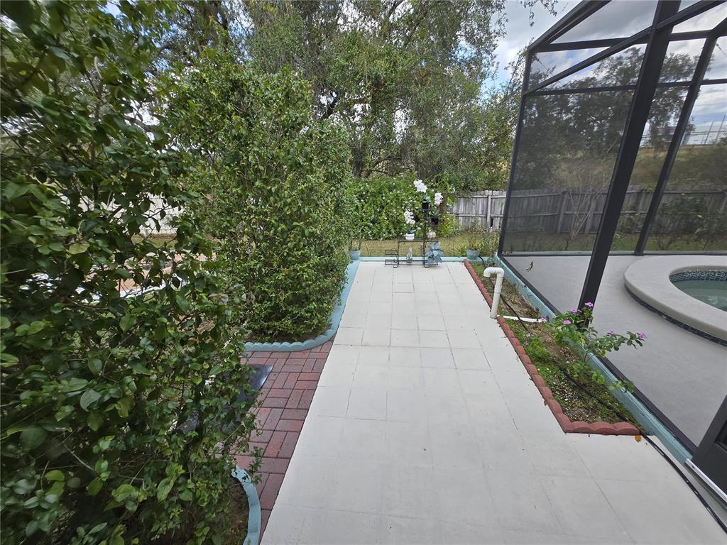 7607 Benji Ridge Trail Kissimmee, FL 34747 - Photo 43 of 58 a view of a backyard