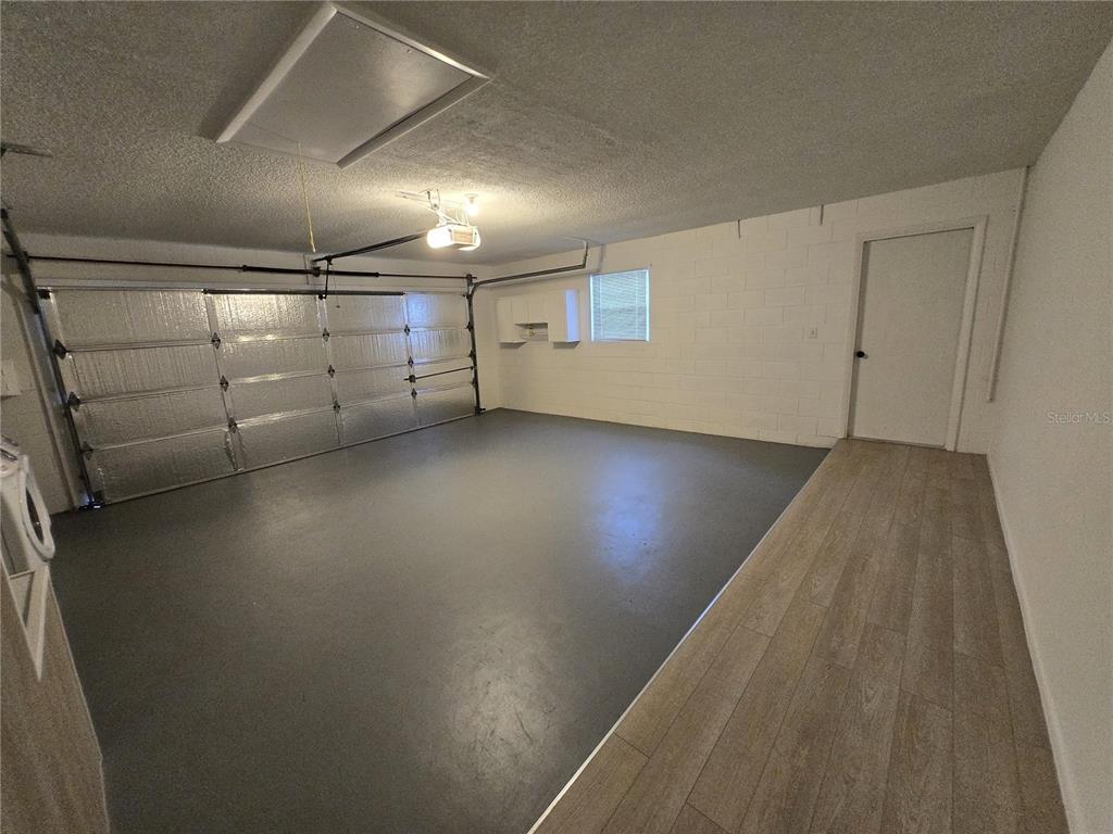 7607 Benji Ridge Trail Kissimmee, FL 34747 - Photo 48 of 58 a view of a garage