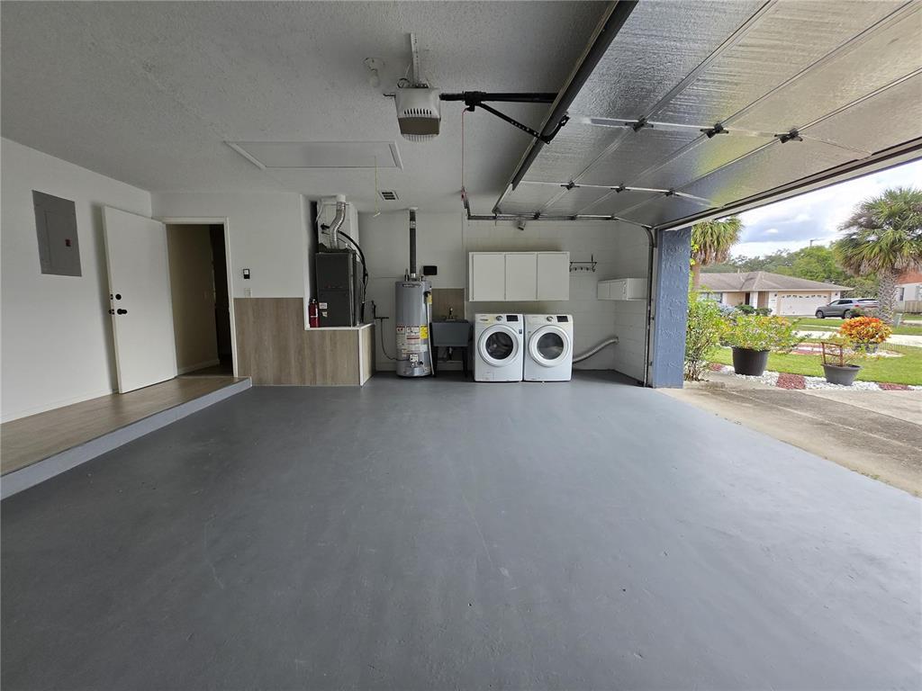 7607 Benji Ridge Trail Kissimmee, FL 34747 - Photo 49 of 58 a view of a car in garage