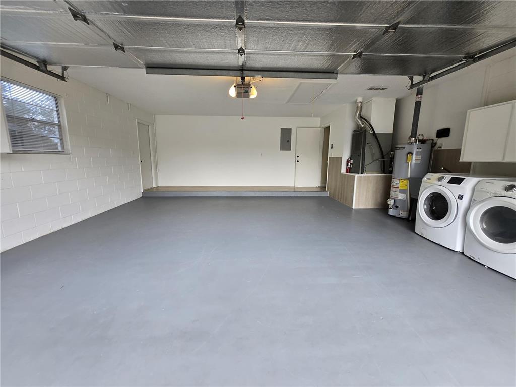 7607 Benji Ridge Trail Kissimmee, FL 34747 - Photo 51 of 58 a view of a refrigerator and microwave