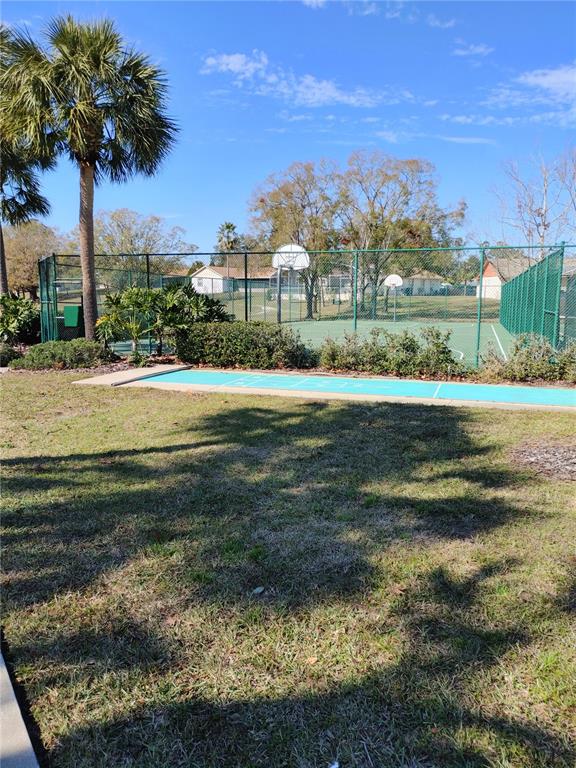 7607 Benji Ridge Trail Kissimmee, FL 34747 - Photo 57 of 58 a view of building with ocean view
