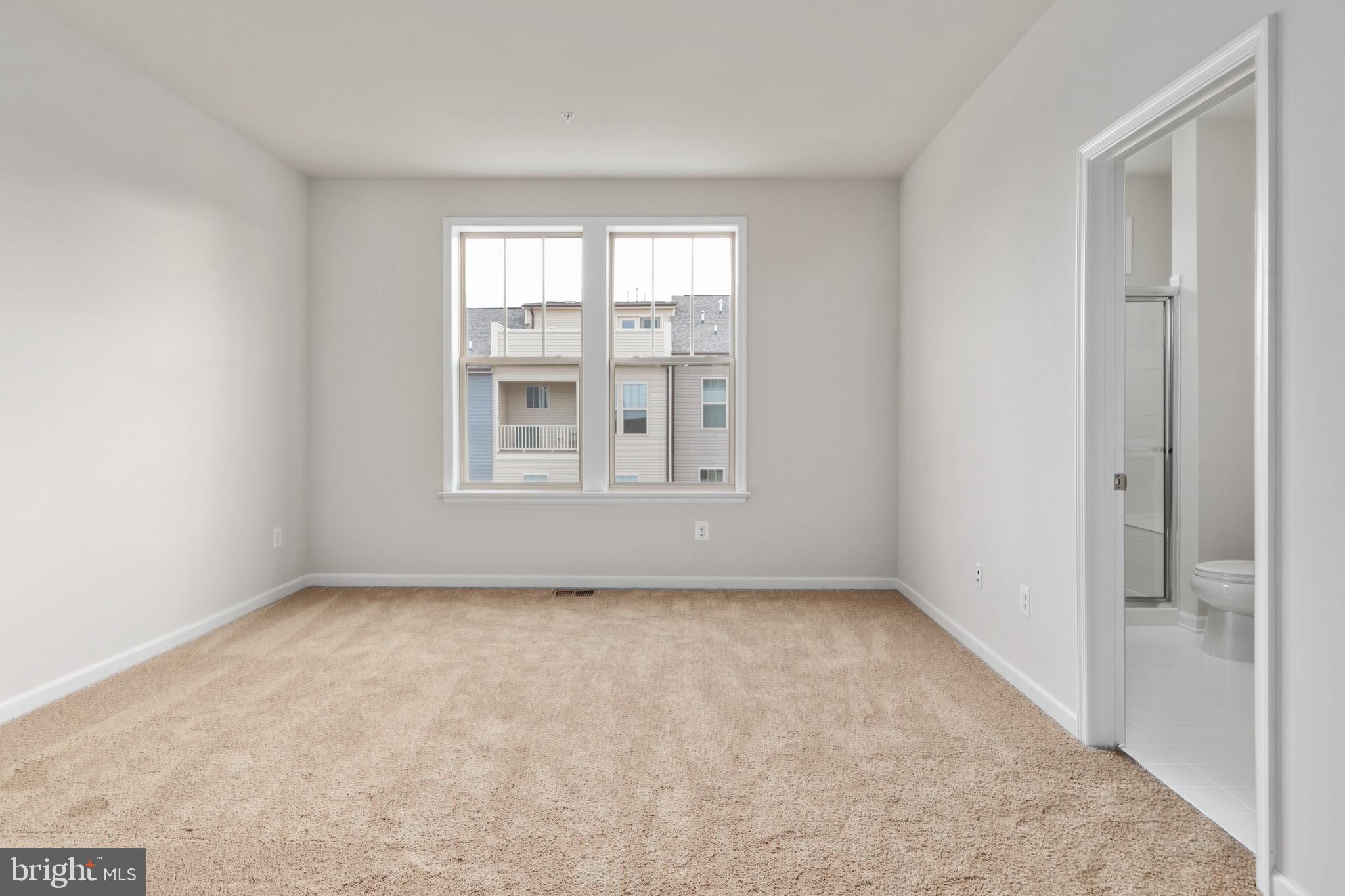 1805 Evans Road Frederick, MD 21702 - Photo 11 of 21 a view of an empty room with a window