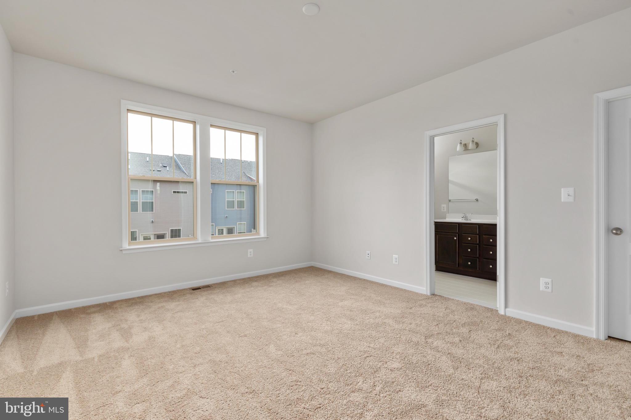 1805 Evans Road Frederick, MD 21702 - Photo 12 of 21 an empty room with windows