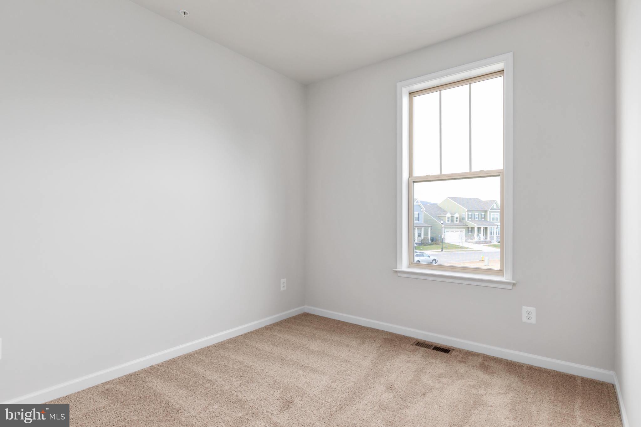 1805 Evans Road Frederick, MD 21702 - Photo 17 of 21 an empty room with a window