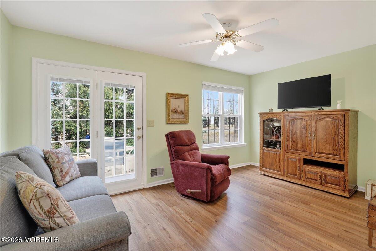 18 Angus Court Jackson, NJ 08527 - Photo 18 of 45 a living room with furniture and a flat screen tv