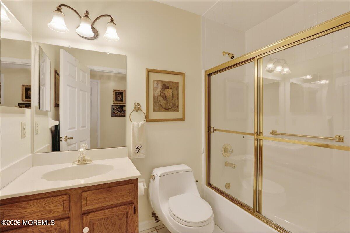 18 Angus Court Jackson, NJ 08527 - Photo 28 of 45 a bathroom with a toilet a sink and a mirror
