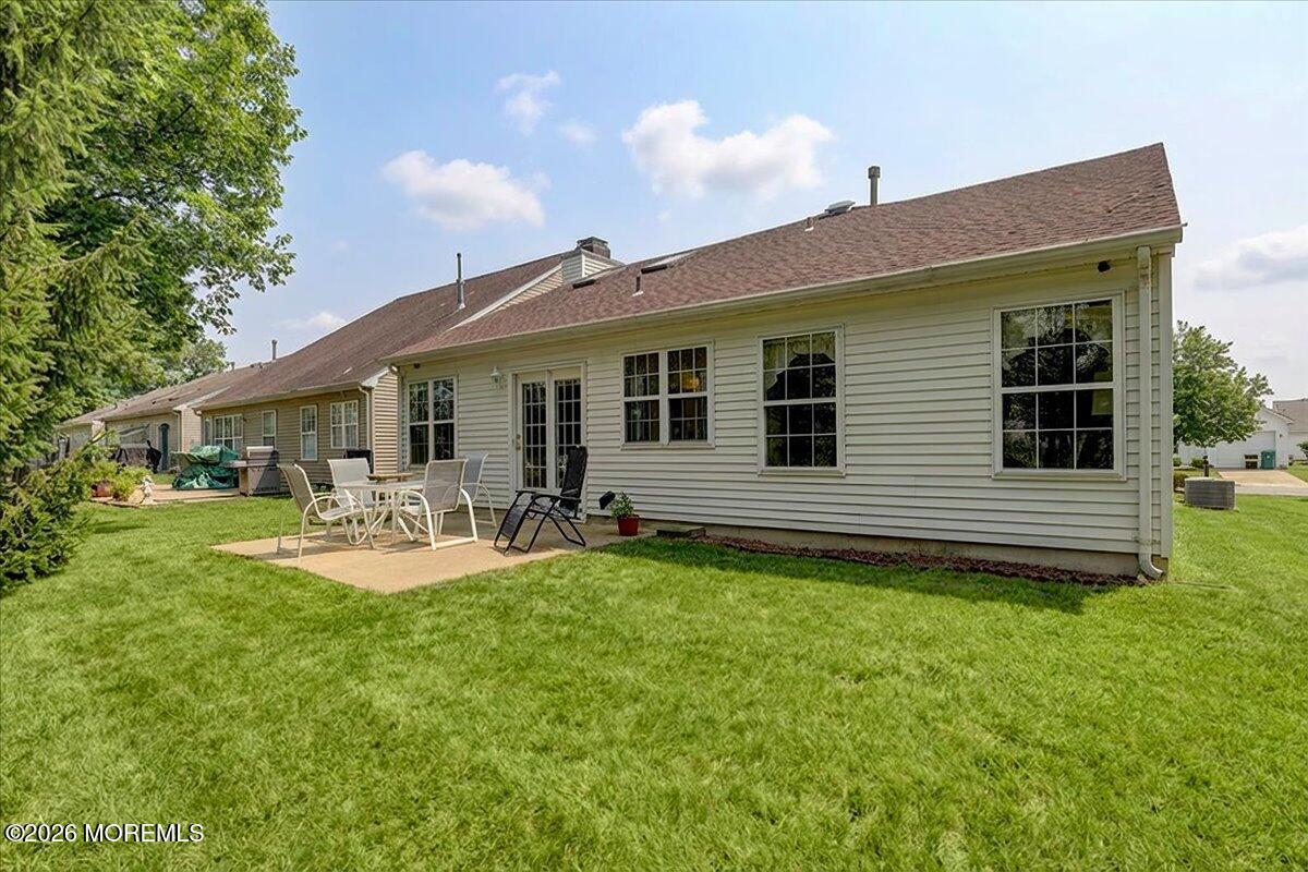 18 Angus Court Jackson, NJ 08527 - Photo 33 of 45 a view of a house with backyard and sitting area