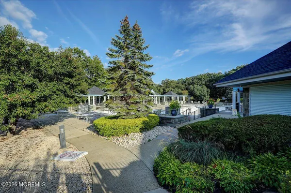 a view of a swimming pool with a patio