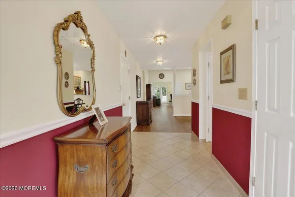 a hall way with furniture