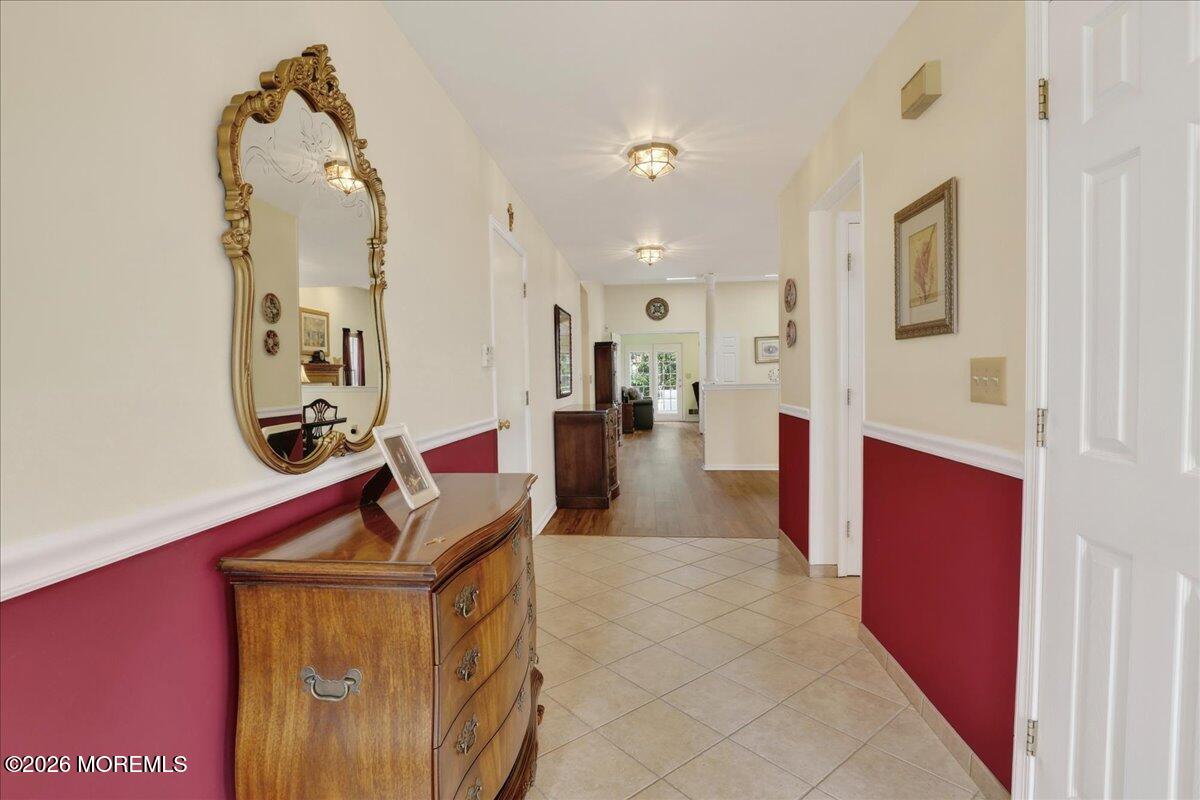18 Angus Court Jackson, NJ 08527 - Photo 5 of 45 a hall way with furniture