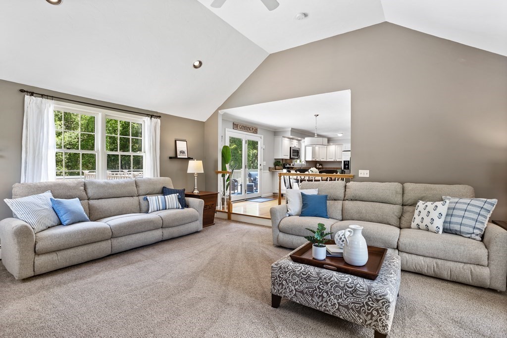 24 Devincent Drive Stow, MA 01775 - Photo 12 of 39 a living room with furniture and a large window