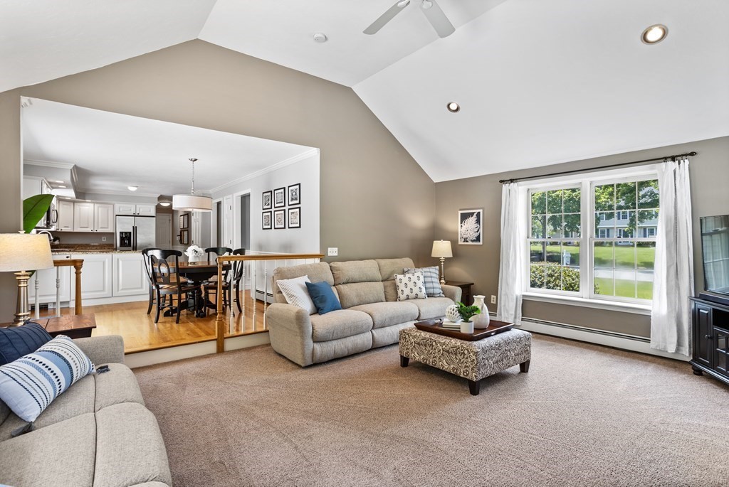 24 Devincent Drive Stow, MA 01775 - Photo 13 of 39 a living room with furniture and a large window