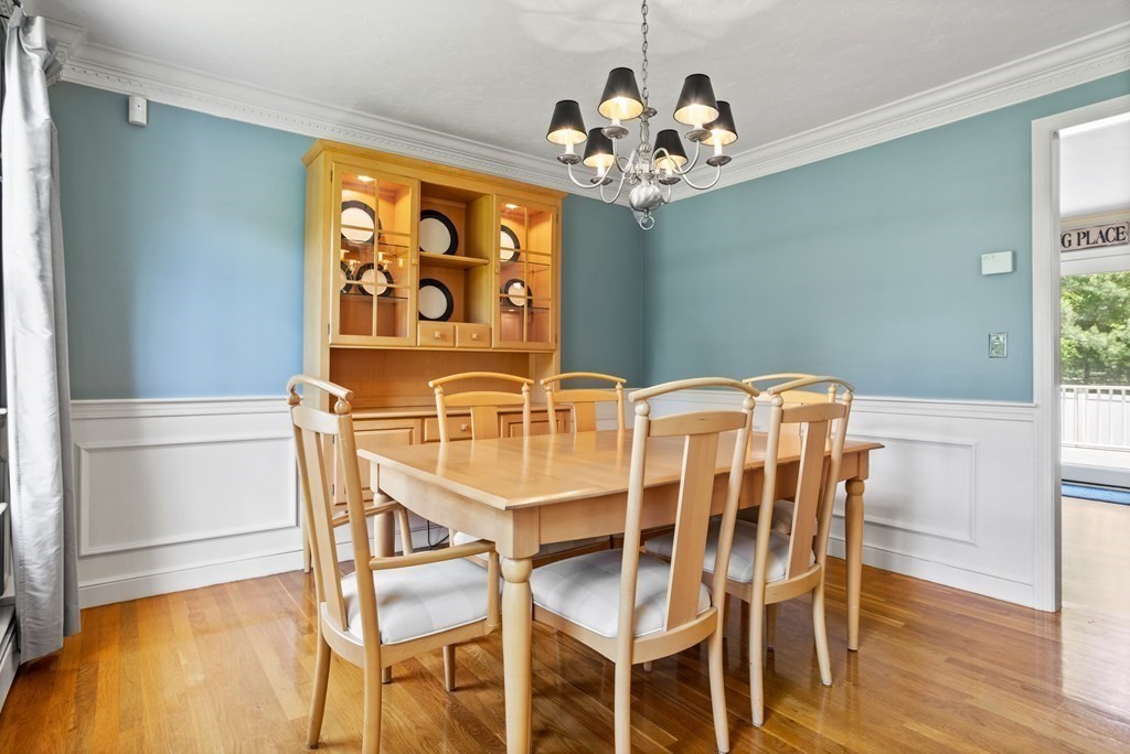24 Devincent Drive Stow, MA 01775 - Photo 15 of 39 a view of a dining room with furniture and wooden floor