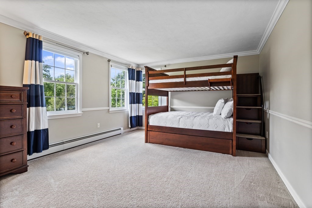 24 Devincent Drive Stow, MA 01775 - Photo 24 of 39 a bedroom with furniture and window