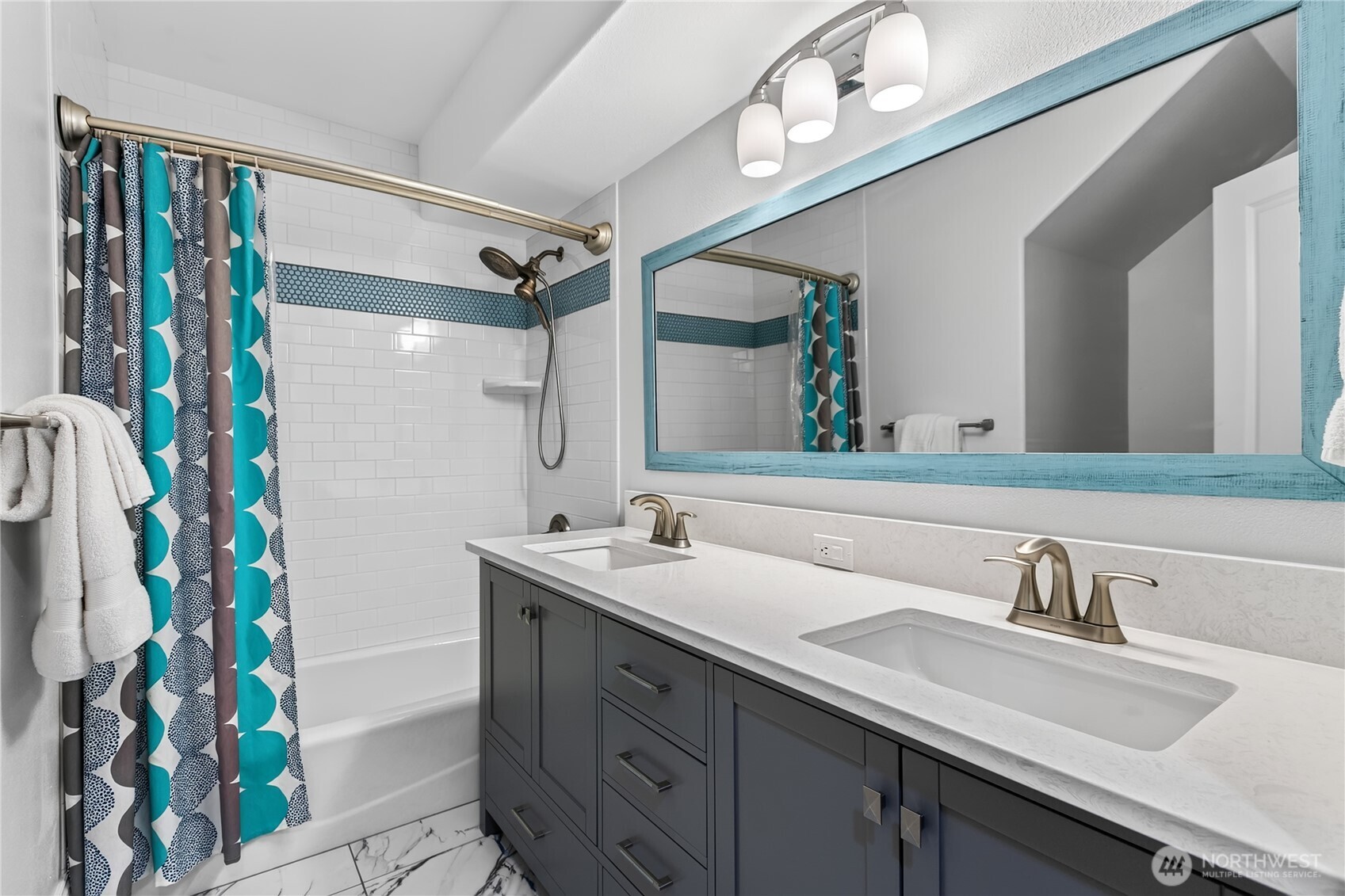 45 Cascade Lane Bellingham, WA 98229 - Photo 31 of 40 a bathroom with a sink mirror and a bath tub
