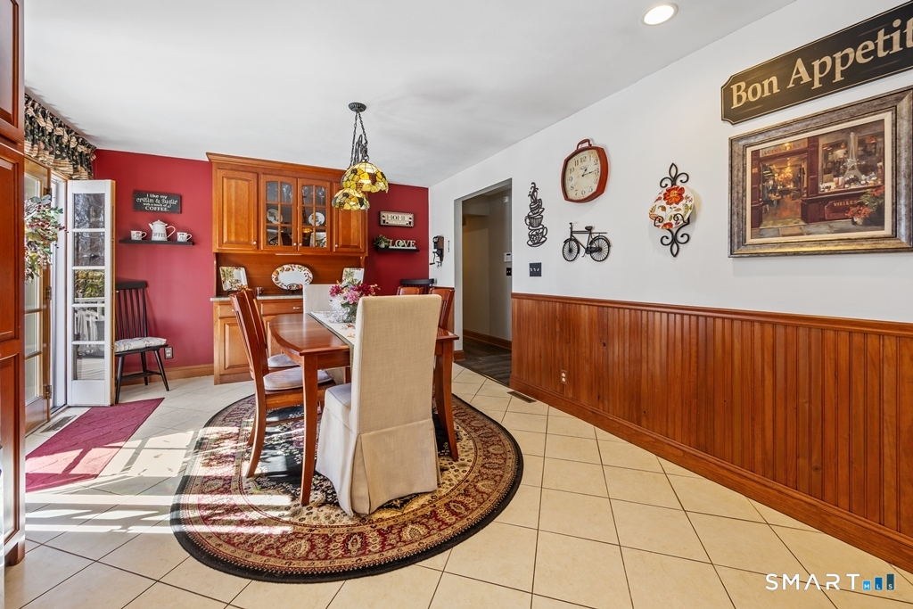 63 Lyman Road Wolcott, CT 06716 - Photo 21 of 70 a view of a dining room with furniture