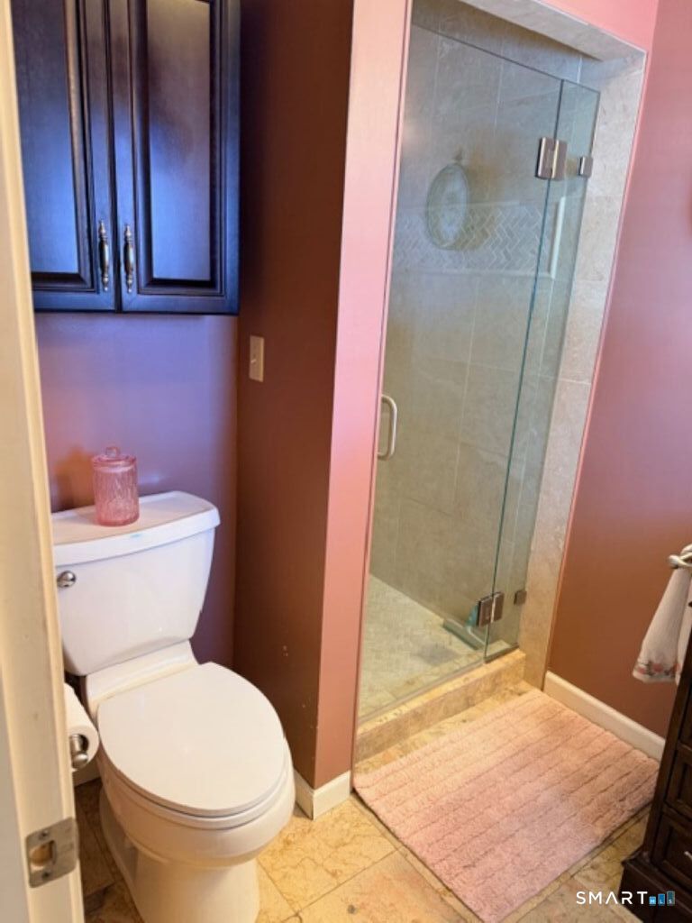 63 Lyman Road Wolcott, CT 06716 - Photo 32 of 70 a bathroom with a toilet and a shower