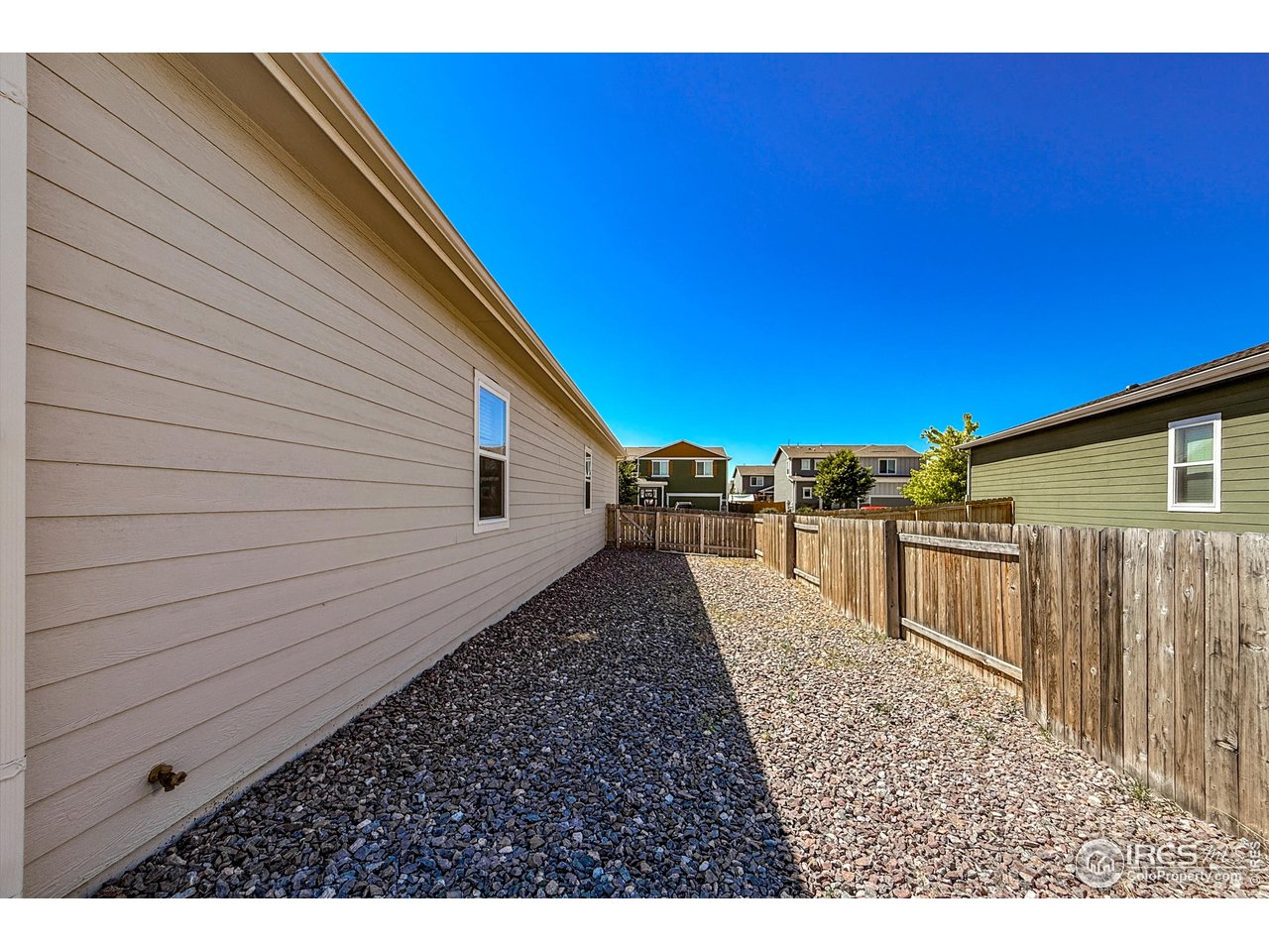 2287 Murray Street Mead, CO 80542 - Photo 33 of 38 a view of a house with a backyard