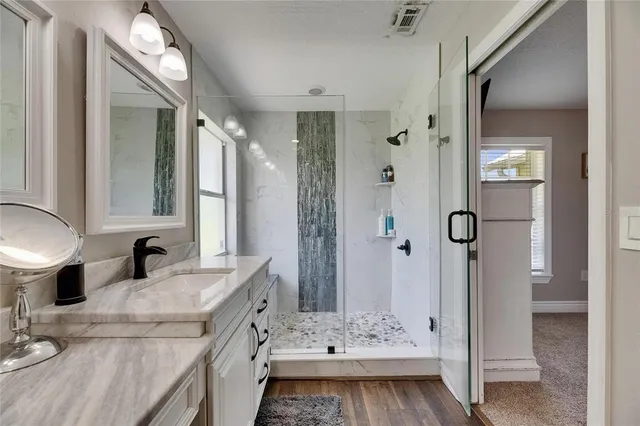 a room with gym equipment and a flat screen tv