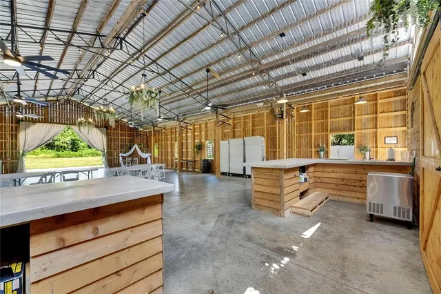 a view of a house with a yard porch and sitting area