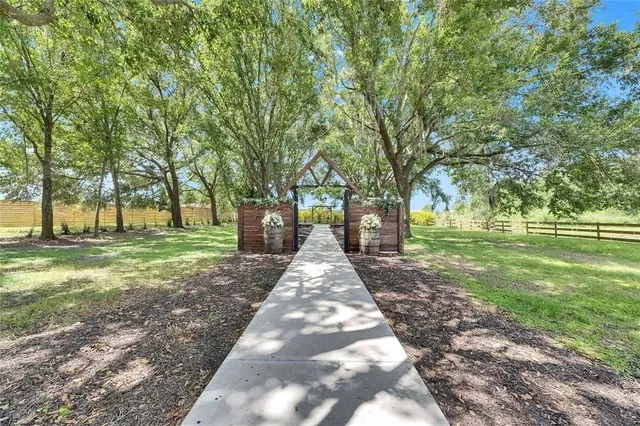 a kitchen with stainless steel appliances granite countertop a stove and cabinets