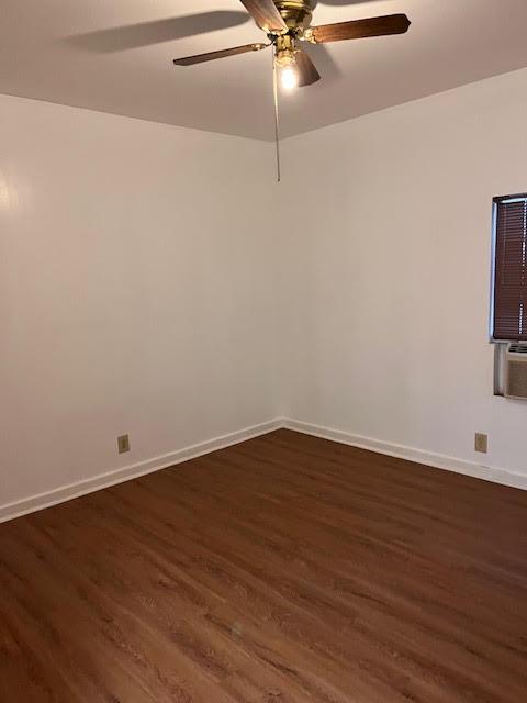 61 East Ellis Street Stockton, CA 95204 - Photo 3 of 15 a view of a room with wooden floor and a ceiling fan