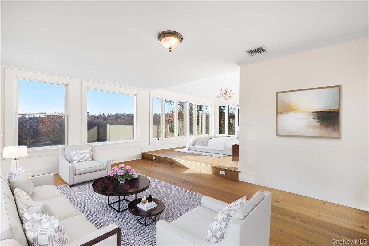83 Somerstown Road Ossining, NY 10562 - Photo 18 of 38 a living room with furniture and a wooden floor