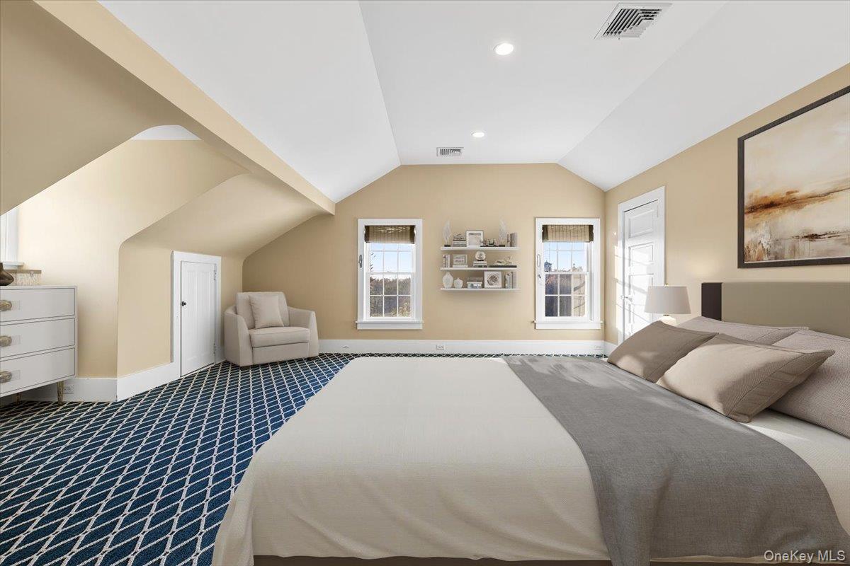 83 Somerstown Road Ossining, NY 10562 - Photo 24 of 38 a spacious bedroom with a large bed and a window