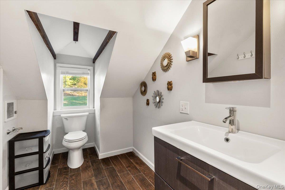 83 Somerstown Road Ossining, NY 10562 - Photo 26 of 38 a bathroom with a sink and a mirror