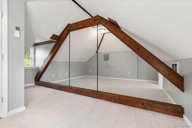 a view of a house with a yard patio and sitting area