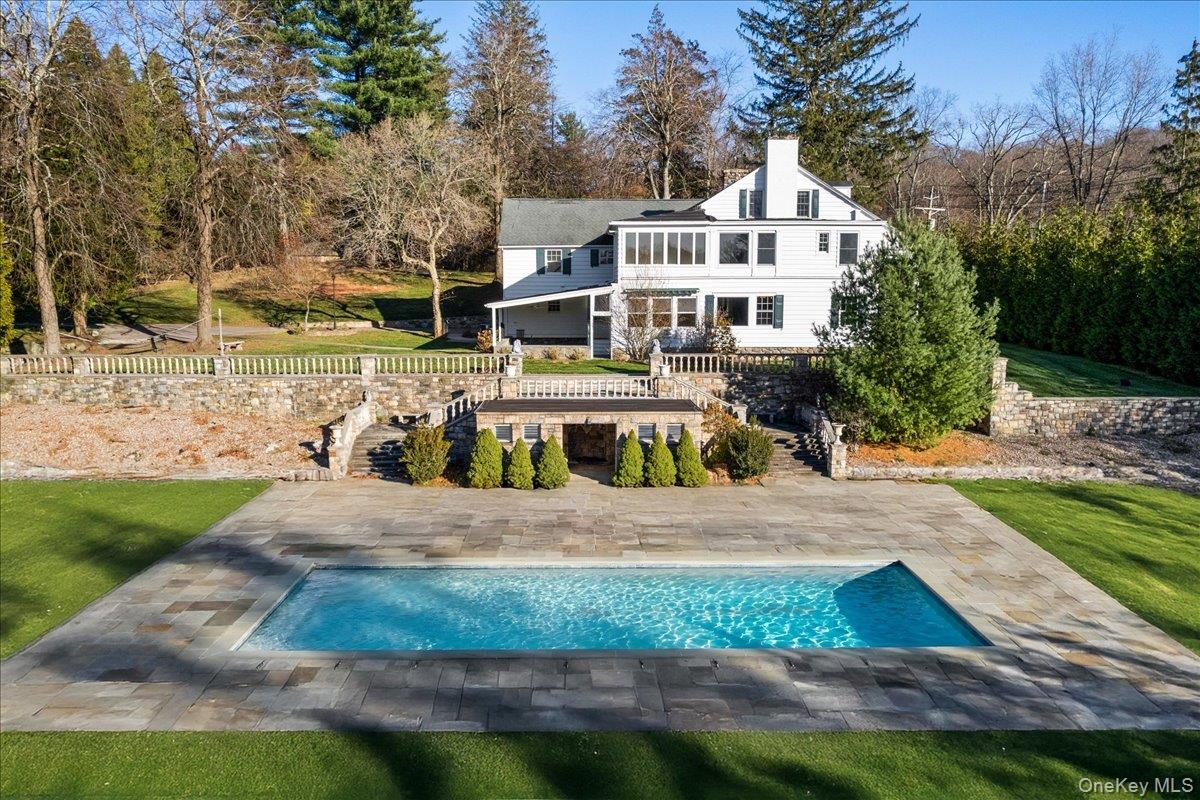 83 Somerstown Road Ossining, NY 10562 - Photo 3 of 38 a front view of a house with a yard