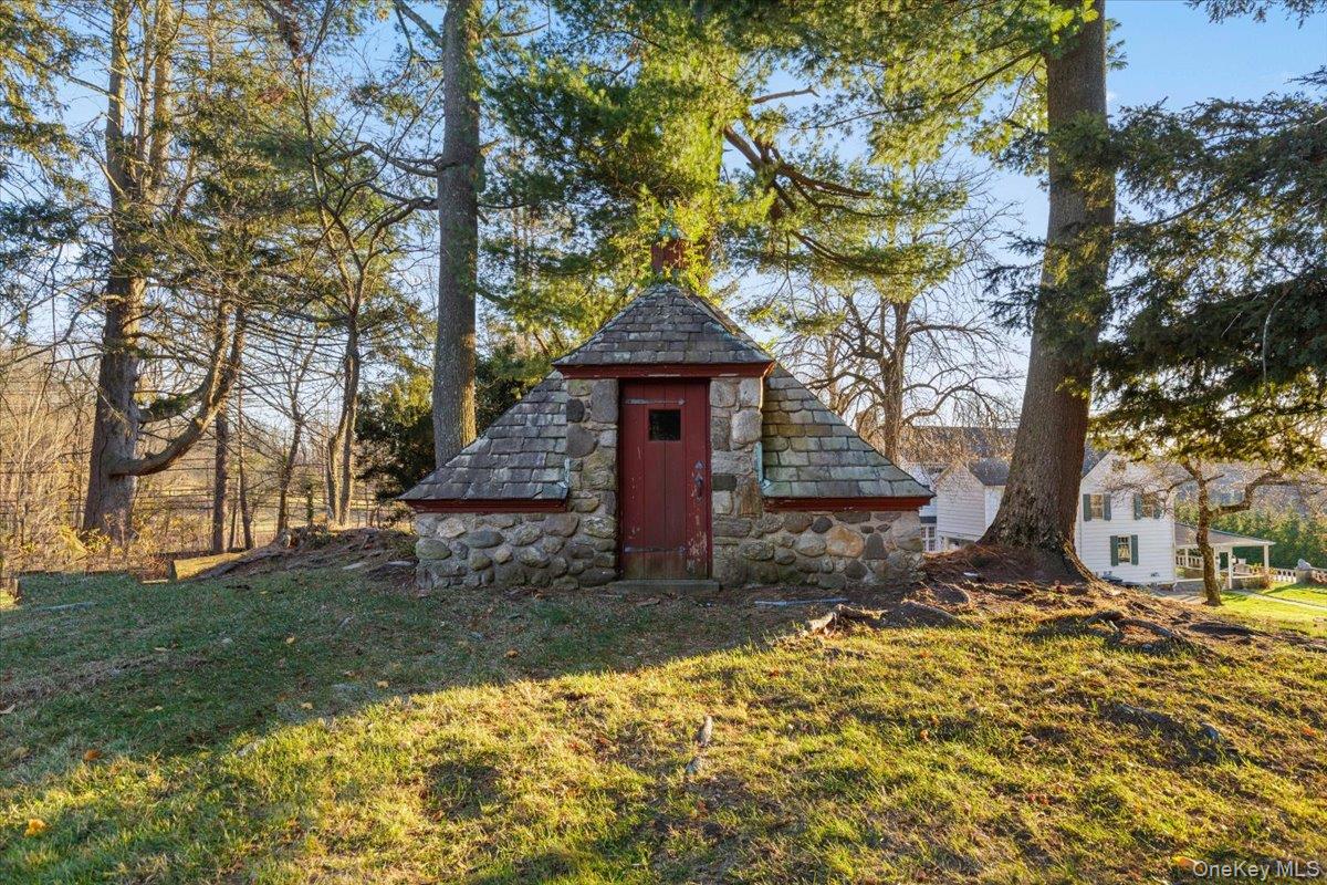 83 Somerstown Road Ossining, NY 10562 - Photo 32 of 38 a front view of a house with a yard
