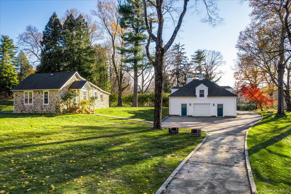 83 Somerstown Road Ossining, NY 10562 - Photo 36 of 38 a front view of a house with yard and green space
